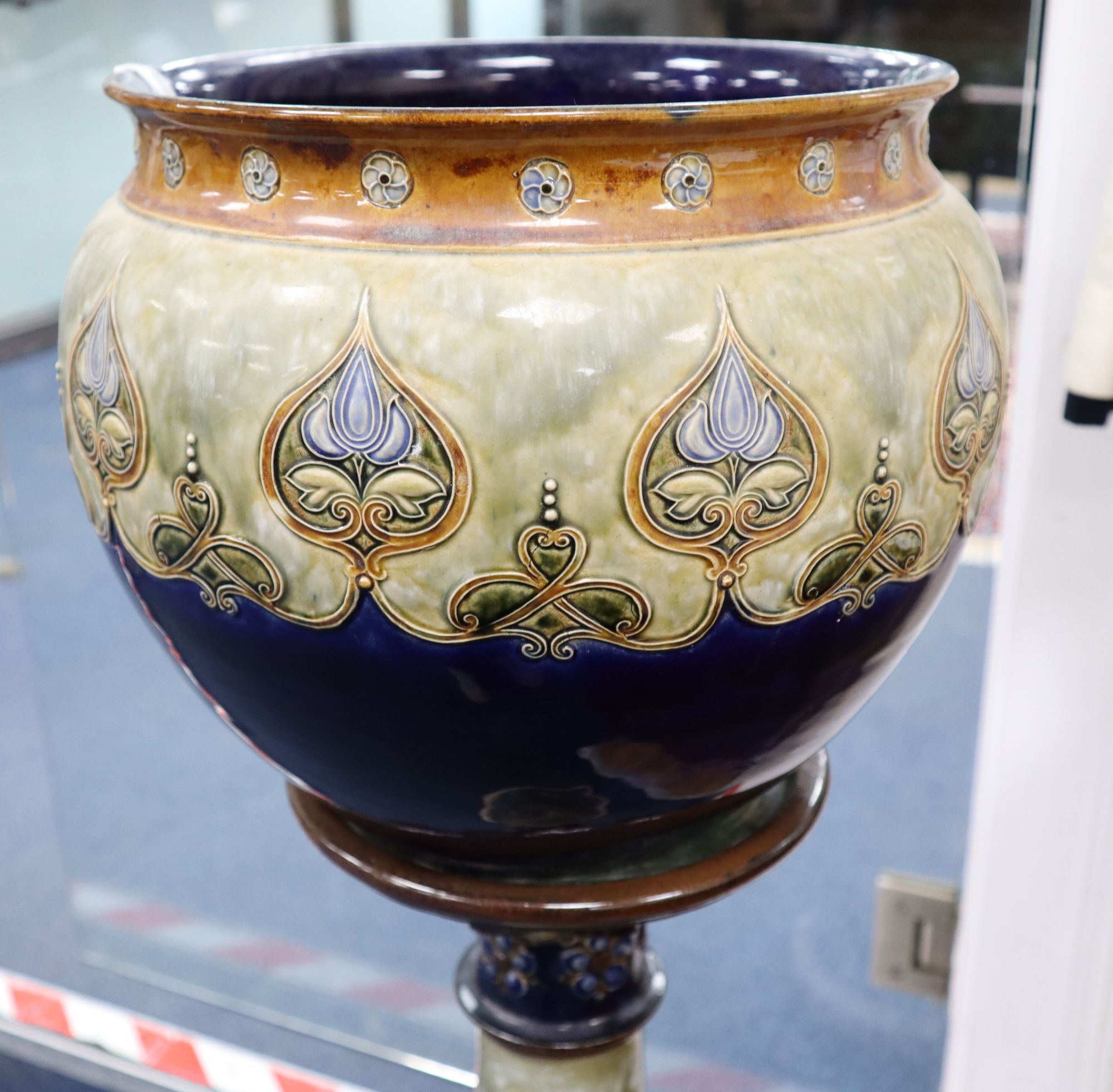 A Royal Doulton jardiniere on stand, overall height 103cm